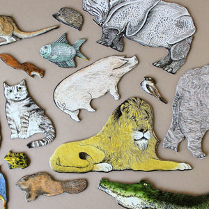 wild-kingdom-puzzle-pieces-in-animal-shapes
