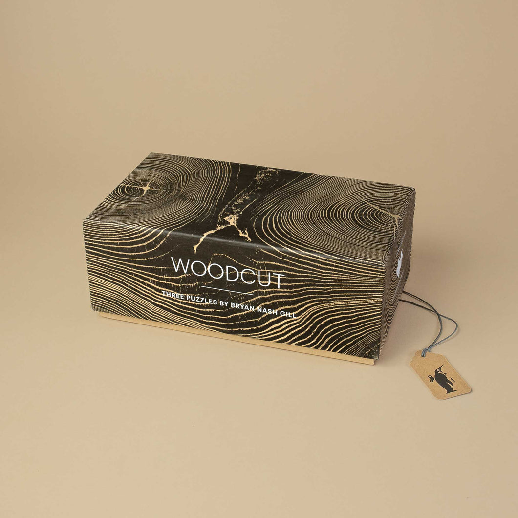   woodcut-three-puzzles-box