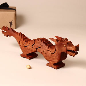 wooden-dragon-puzzle-with-egg