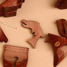 Load image into Gallery viewer, wooden-salmon-surrounded-by-scattered-pieces