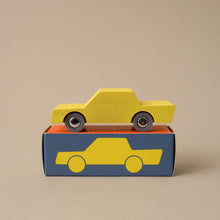 Load image into Gallery viewer, yellow-wooden-back-forth-car-on-top-of-box