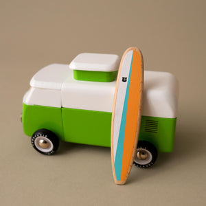 surfboard-propped-against-van