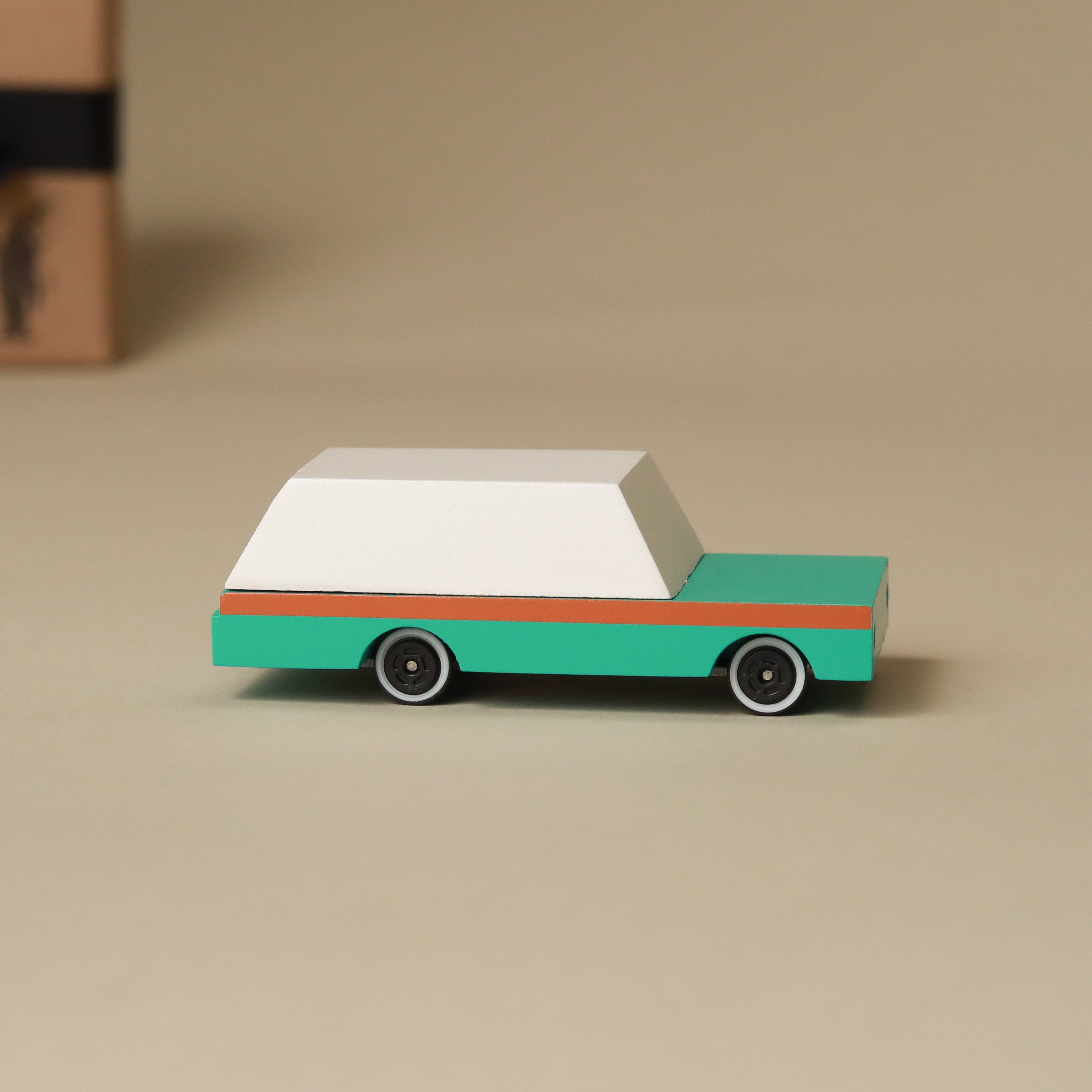 wooden-candy-wagon-teal-with-a-brown-stripe-and-white-top