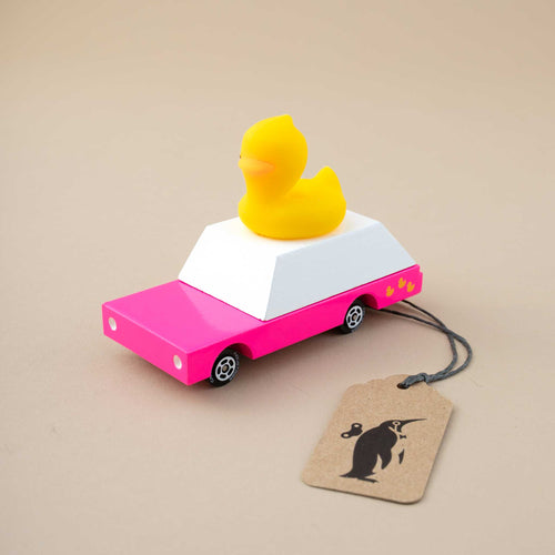 pink-wooden-matchbox-car-with-yellow-duck-on-roof
