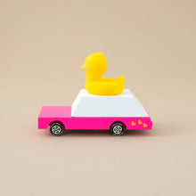 Load image into Gallery viewer, side-view-of-pink-car-with-yellow-duck-on-roof-and-yellow-duck-decals