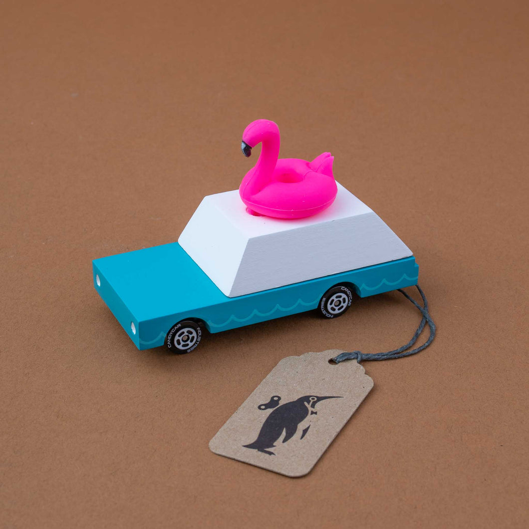 blue-wooden-car-with-pink-flamingo-topper