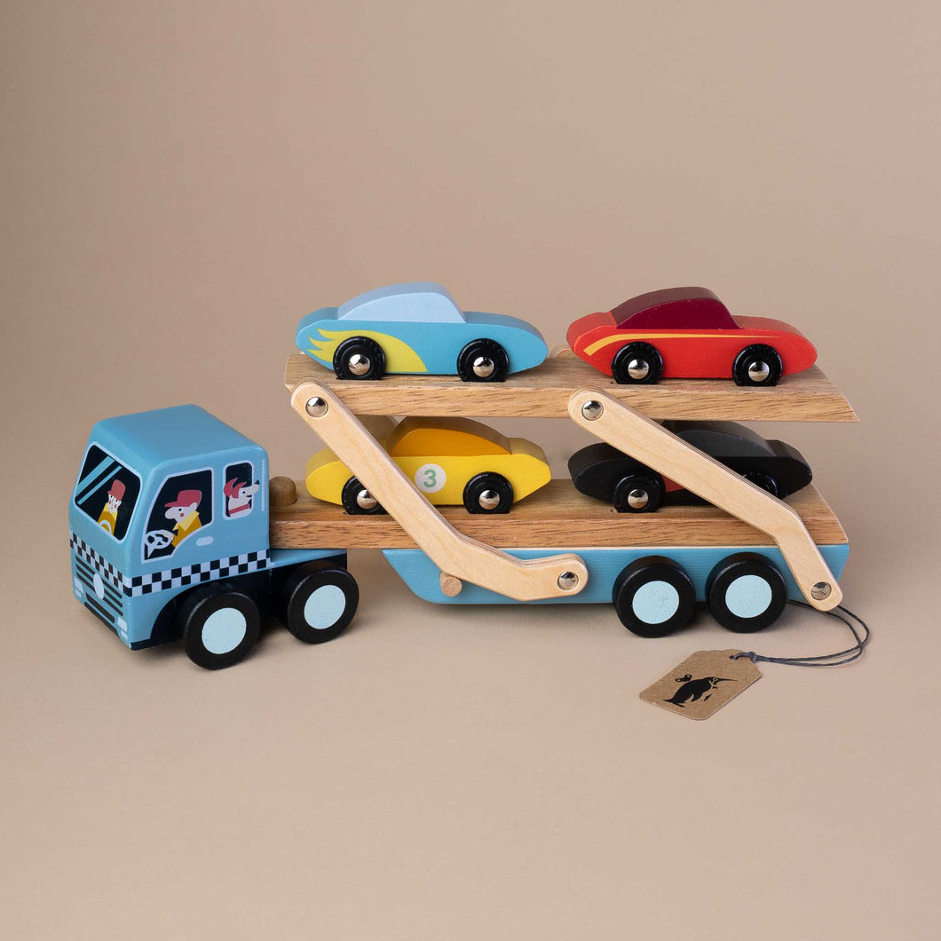 blue-car-transporter-carrying-four-cars-in-different-colors
