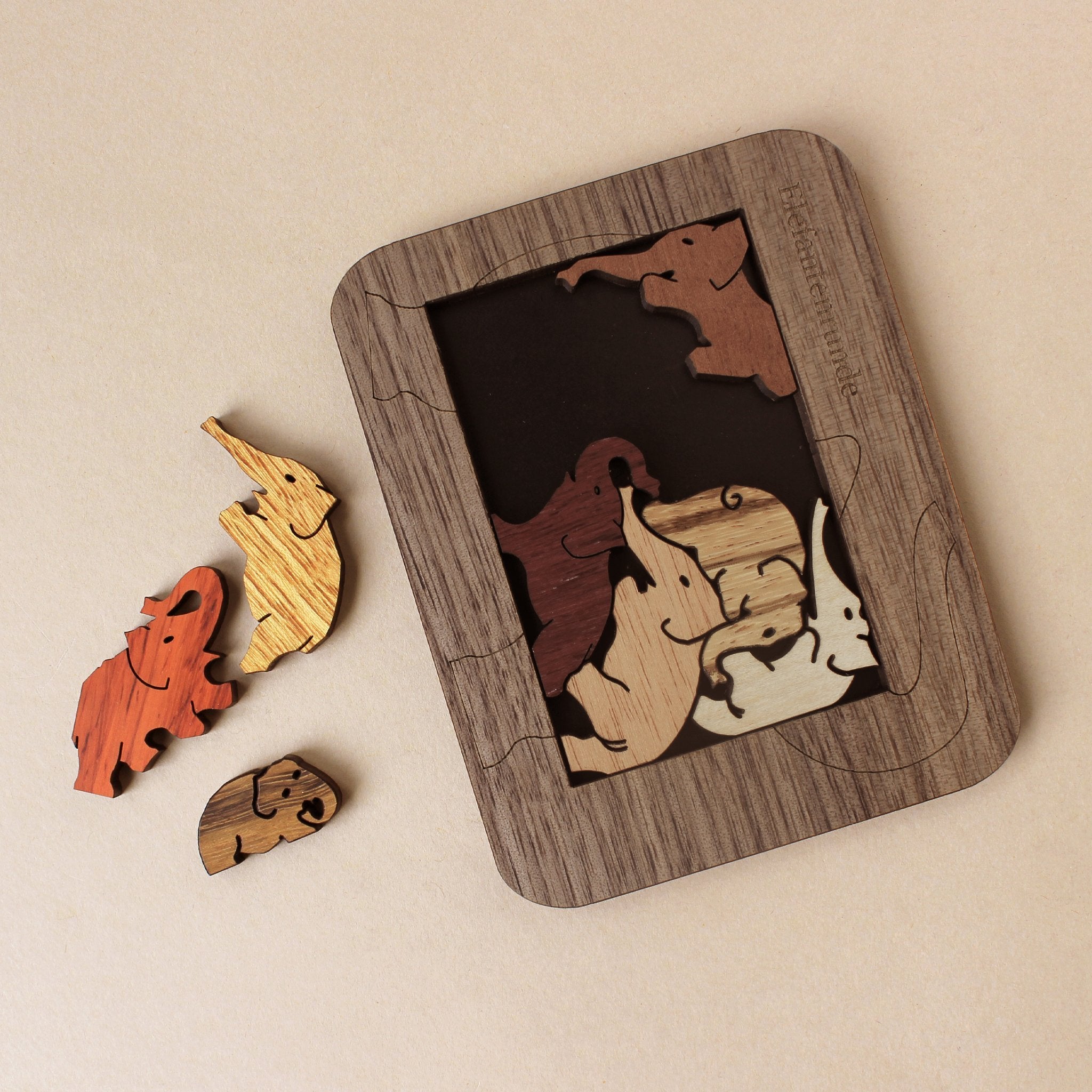 wooden-elephants-greyish-wood-tone-frame