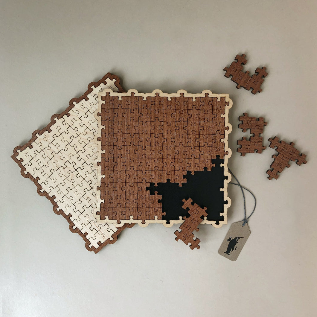 wooden-pento-puzzle-with-glued-togthe-jigsaw-pieces