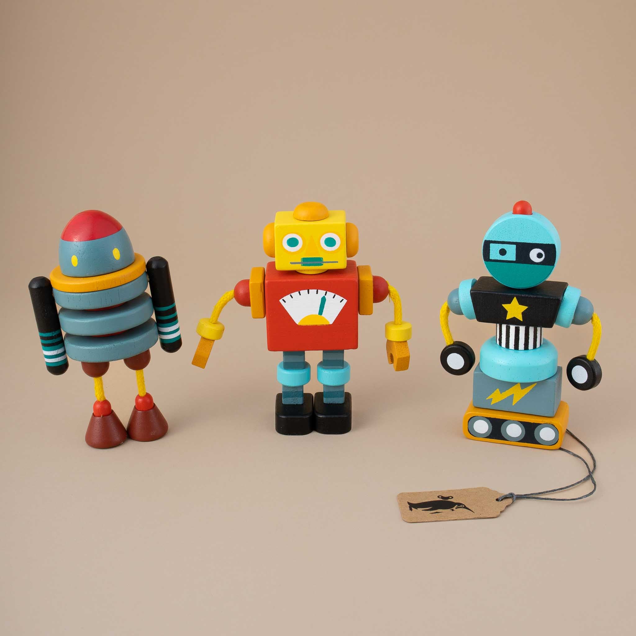 three-colorful-wooden-robots