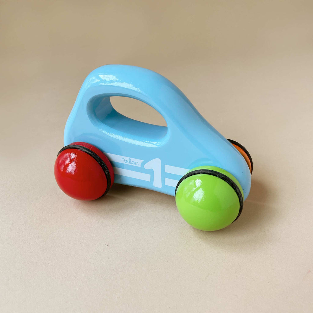blue-wooden-roly-poly-car-with-multicolor-wheels