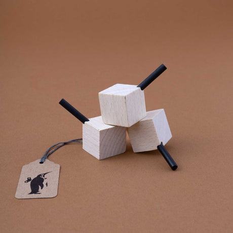 wooden-cube-with-black-handle