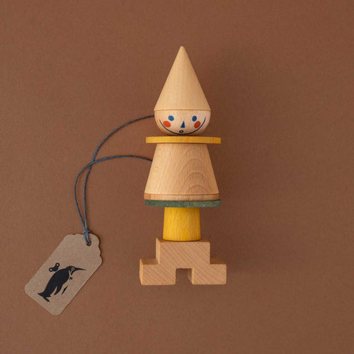 wooden-stick-figure-with-parts-in-different-shapes-and-colors