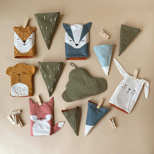 woodland-advent-calendar-woodland-animal-pockets-and-green-trees-and-mountains-with-clothespins-to-hang-up