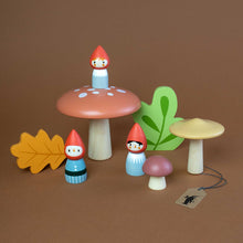 Load image into Gallery viewer, three-mushrooms-in-different-sizes-and-leaves-and-three-little-gnomes-made-from-wood