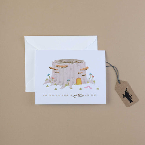    worm-and-cozy-home-greeting-card-shows-a-tree-stump-made-into-a-home