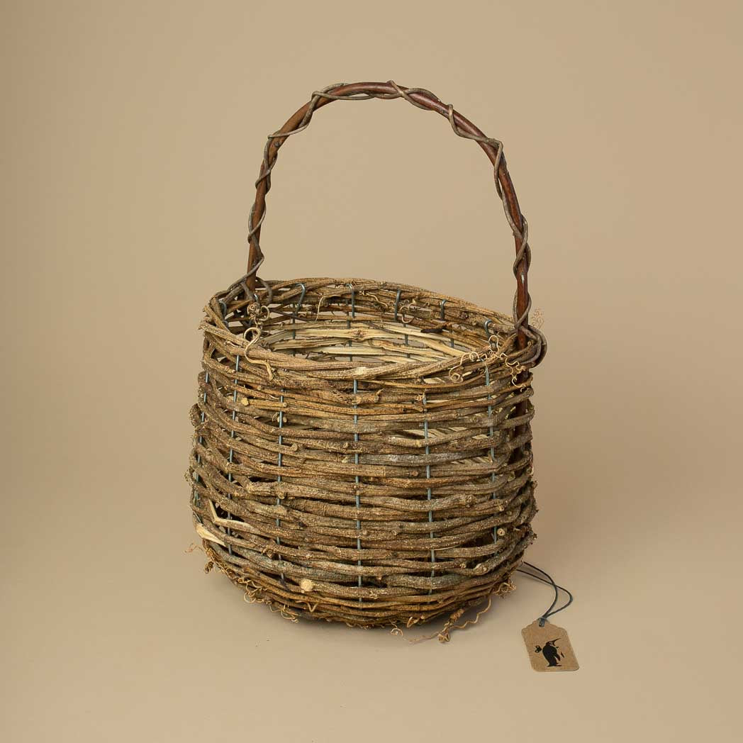 brown-woven-round-basket-with-long-thin-handle