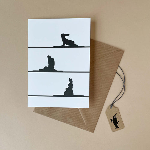 yoga-rabbit-greeting-card-rabbits-sillohuette-in-yoga-poses-and-brown-envelope