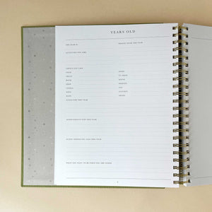 inside-page-of-childhood-memories-journal-with-space-to-fill-out-facts-for-years-old